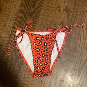Target swim suit bottoms, size small, red/blue/black/white cheetah bottoms,